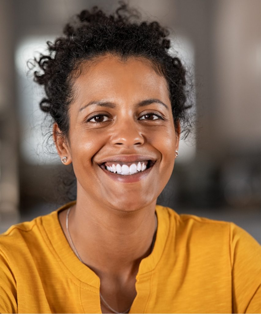 Woman in yellow colored shirt