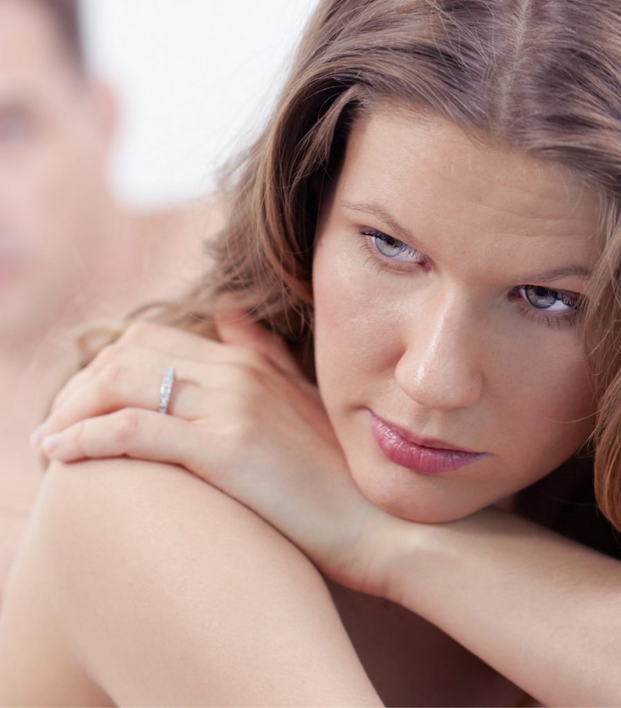 Woman resting her chin on her hand