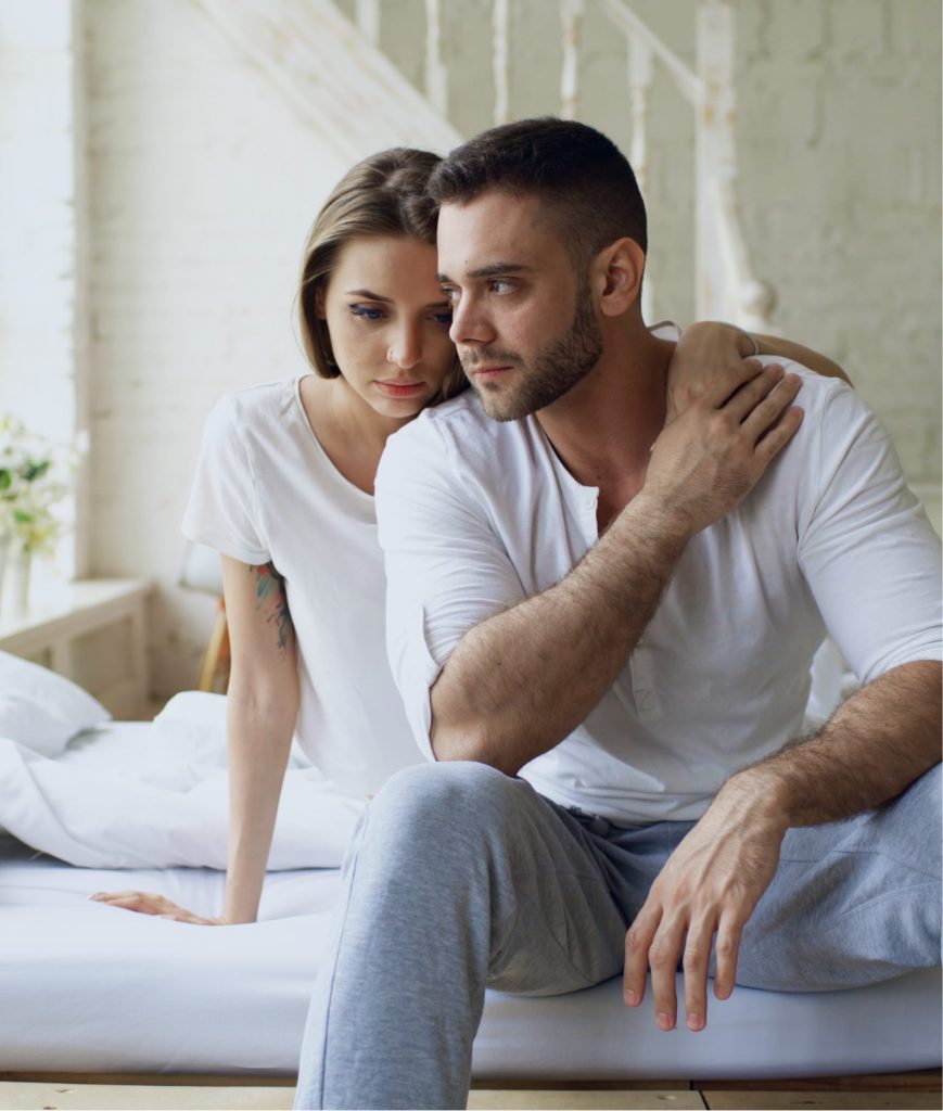 Man and woman sitting together